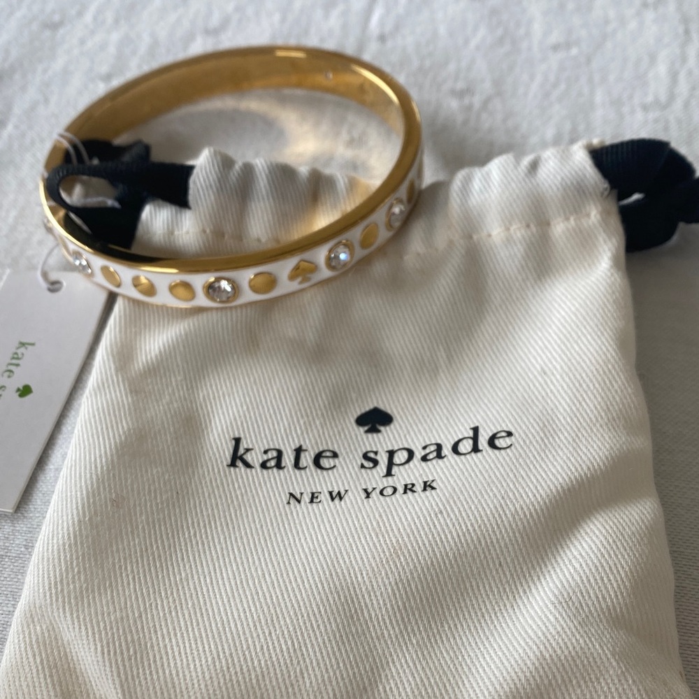 Kate Spade faux Gold and White Colored Spade Bangle